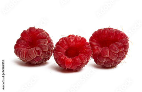 ripe raspberries isolated