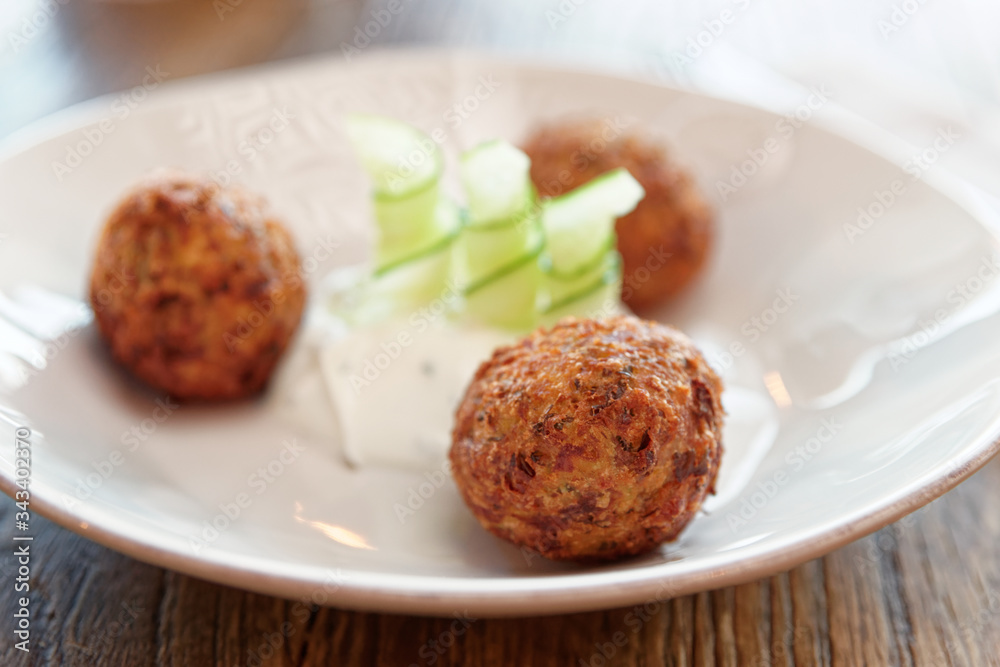 Vegetable croquettes close-up on white plate Vegetable croquettes close-up on white plate