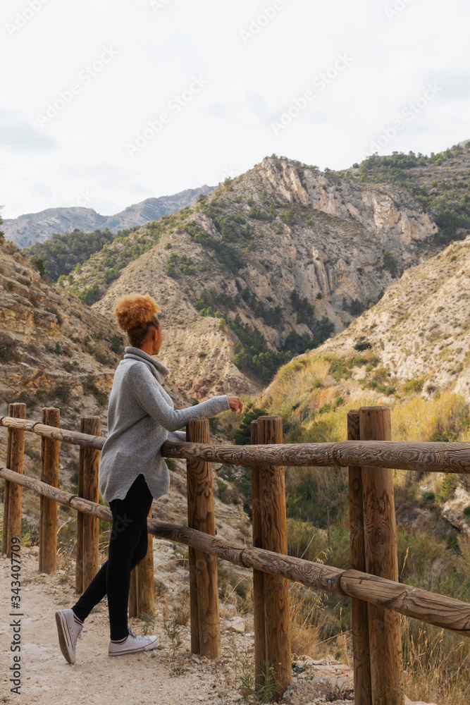 Naklejka premium African american black woman, Mountain day.