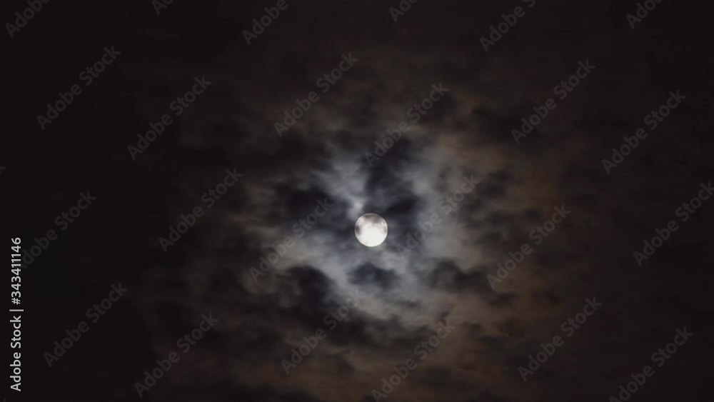 Mysterious night sky with full moon clouds on a night sky Mysterious night sky with full moon clouds on a night sky