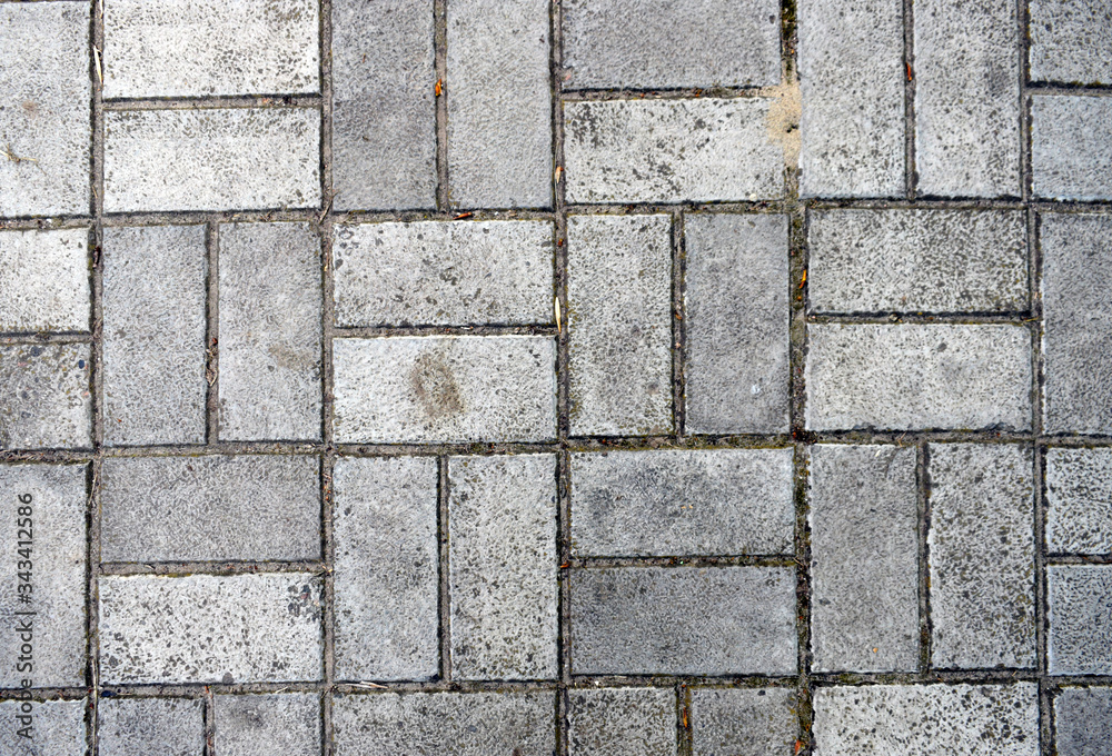 Obraz premium Gray paving slabs of a rectangular shape.