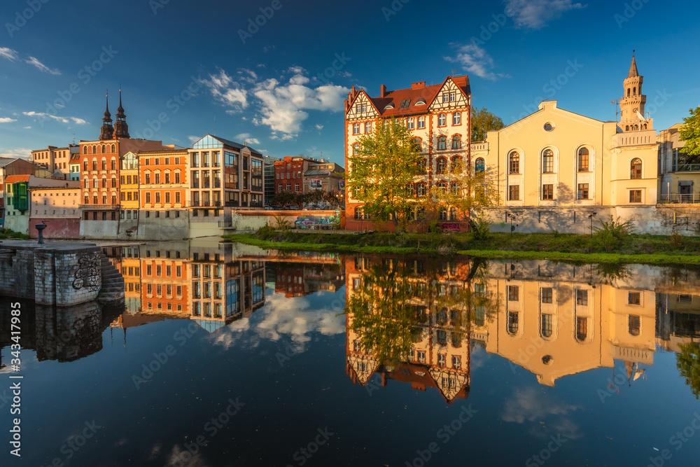 Fototapeta premium Spring view of city Opole in Silesia in Poland. Historical old town in gold light.