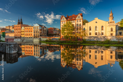 Spring view of city Opole in Silesia in Poland. Historical old town in gold light. © PawelUchorczak