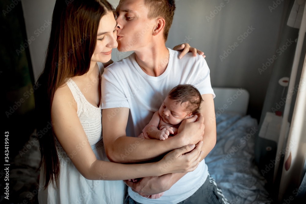 Newborn baby with mom and dad at home
Newborn baby with mom and dad at home