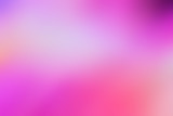 Soft, blurred background. Bright vibrant colors of pink, peach, purple and red.