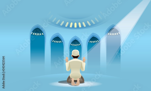 A devout Muslim praying in a holy mosque.