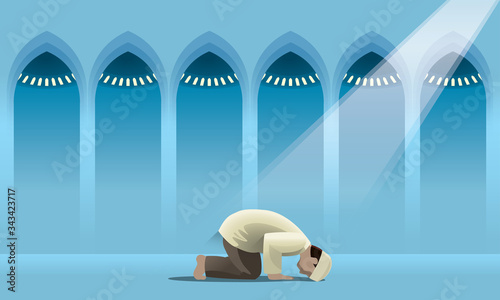 A devout Muslim praying in a holy mosque.