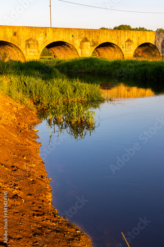 Old stone bridge over Vitek pond near Trebon, Southern Bohemia, Czech Republic photo