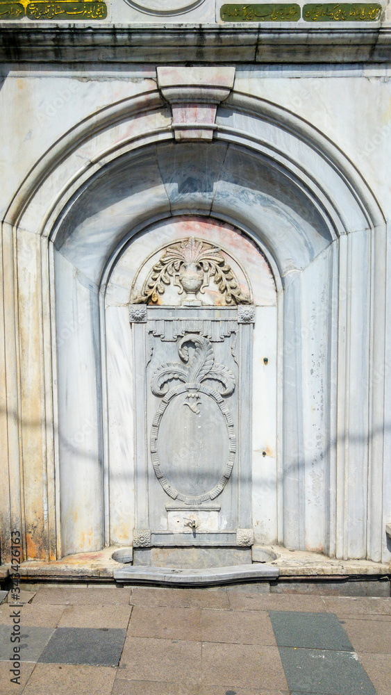 Old Faucet in ornate marble, Istanbul, Turkey