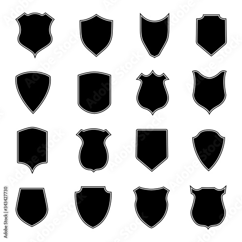 Set shield shapes. Badge, crest and icon of security. Blank black banner and emblem for coat of safety service or police. Heraldic, medieval, military concept. Logo soccer. Medal or insignia. Vector