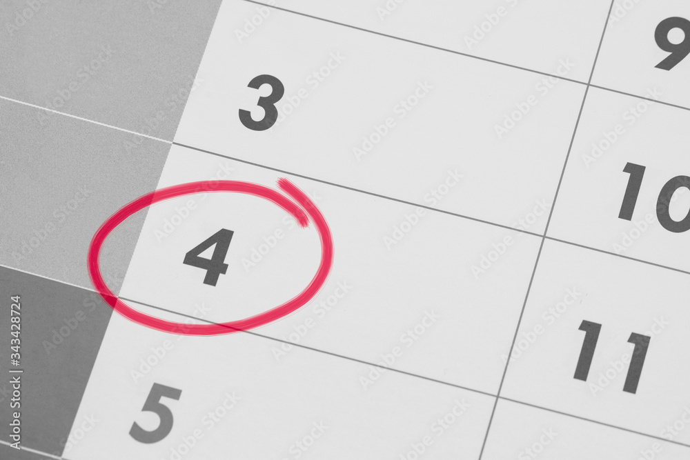 4th Date of the Month marked in red marker pen on a simple planner calendar 4th Date of the Month marked in red marker pen on a simple planner calendar