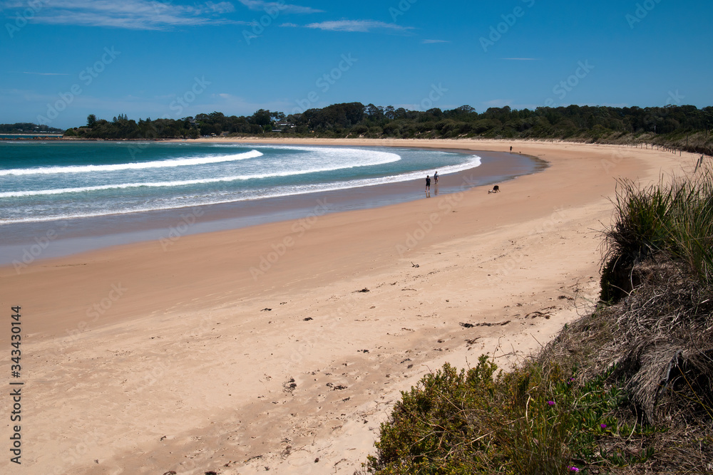 Tomakin Australia, view along beach on a sunny spring day Tomakin Australia, view along beach on a sunny spring day