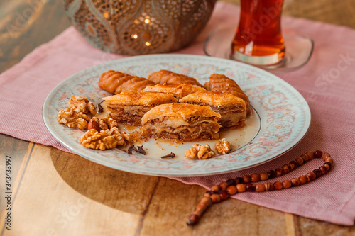 Turkish baklava, kalburabasti and tea on ramadan photo