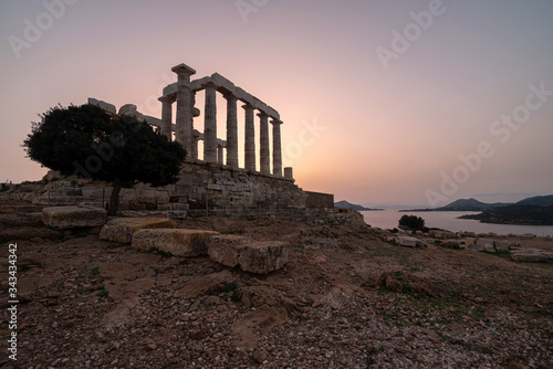 Poseidon temple in Sounion cape at sunset, Greece