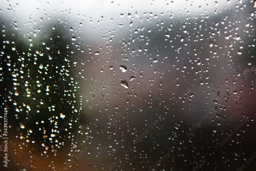 Blurred natural background of drops on the window. Abstract background Blurred natural background of drops on the window. Abstract background