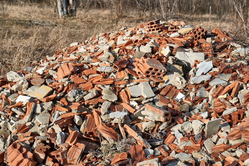 Pile of debris of a destroyed building, mostly tiles and bricks Pile of debris of a destroyed building, mostly tiles and bricks