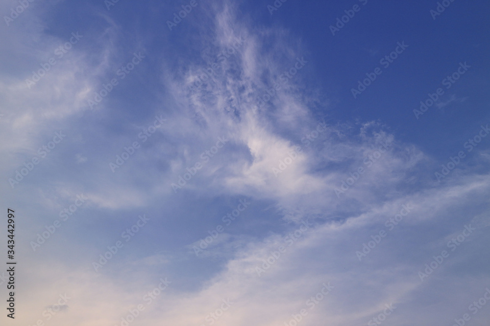 blue sky with clouds,abstract glowing background.