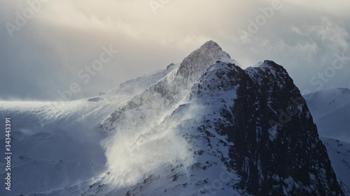 The top of a snowy mountain, Fjords
