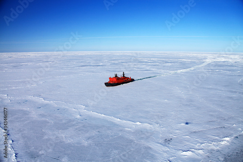 Obraz na płótnie Red icebreaker in the middle of Arctic ocean