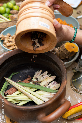 jamu traditional drink being boiled on a pot photo