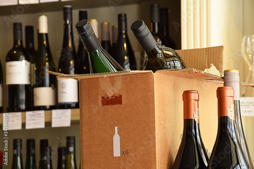 The wine is put in a box and ready for home delivery