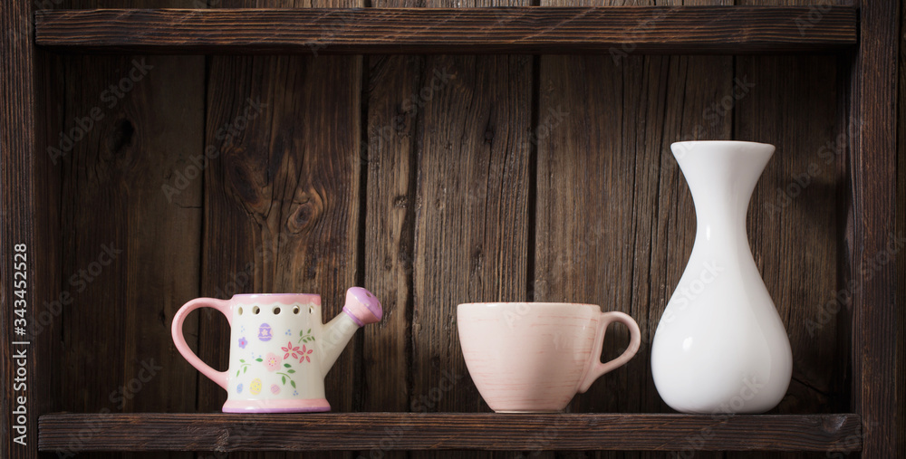 vases on old dark wooden background vases on old dark wooden background
