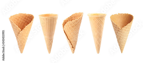 Set of empty wafer ice cream cones on white background. Banner design