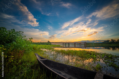 sunset over the river in Majuli Island, Assam
