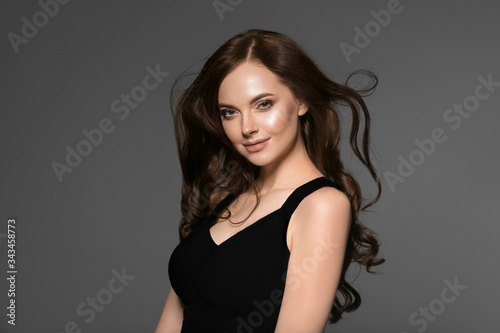 Fly hair Woman beauty face long hairstyle casual natural fashion make up brunette beauty hairstyle