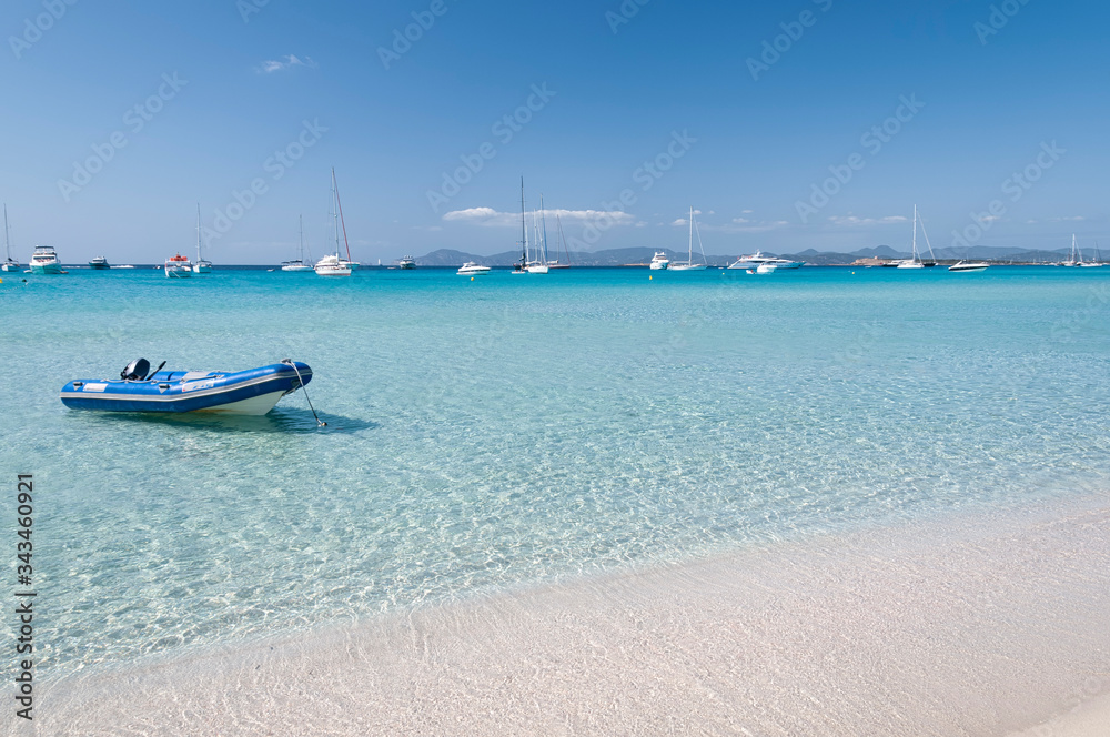 Fototapeta premium Formentera Island, Illetas beach, Spain. Fantastic Illetas beach and excellent landing point for boats and yachts. Travel and tourism concept