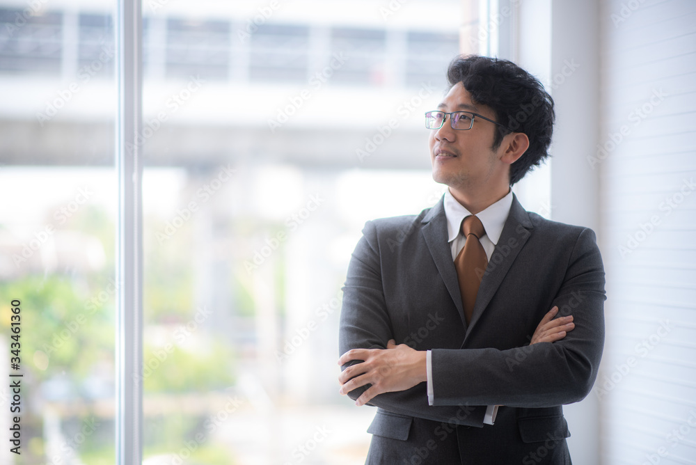 smart Asian businessman in suit smart Asian businessman in suit