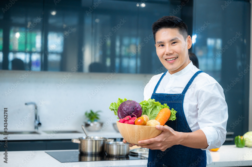 People are showing vegetables and fruits in the kitchen for healthy cooking. People are showing vegetables and fruits in the kitchen for healthy cooking.