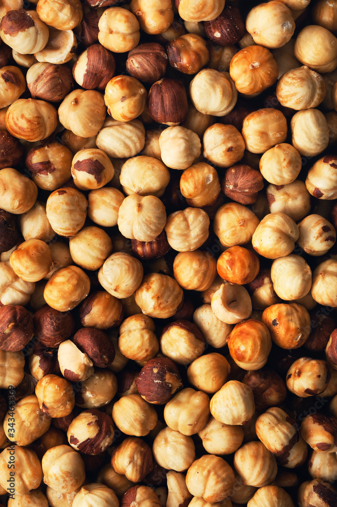 Peeled roasted hazelnut. Background and texture. Peeled roasted hazelnut. Background and texture.