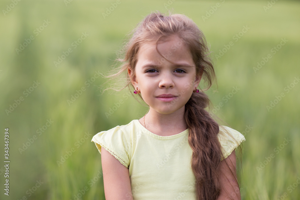 portrait of a little girl in nature portrait of a little girl in nature