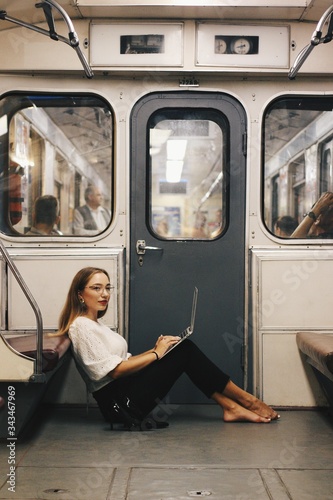 young woman with a train