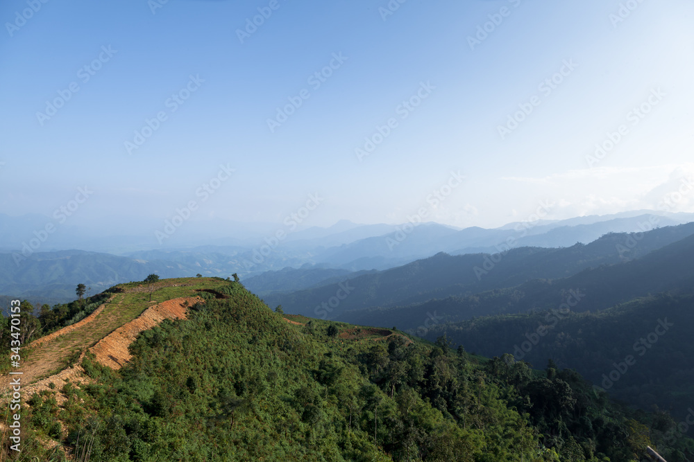 A high angle shot Landscape Mountain range  and blue sky