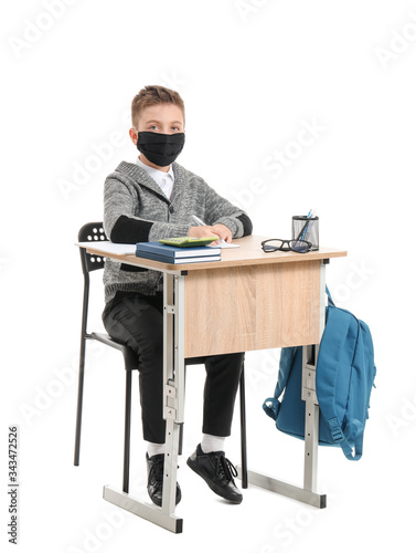 Little schoolboy in protect...