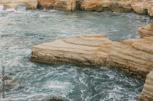 wet stones in water of mediterranean sea in cyprus