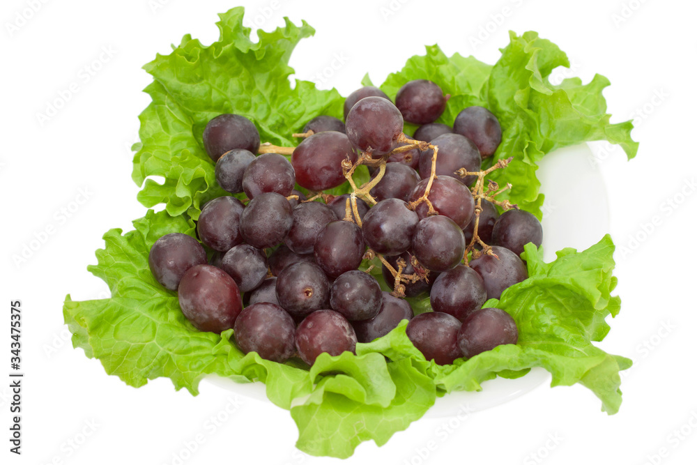 Fototapeta premium Red round grapes with salad whole view isolated on white background