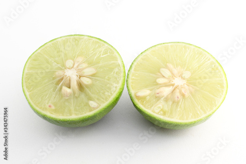 Juicy slice of lime isolated on  white background