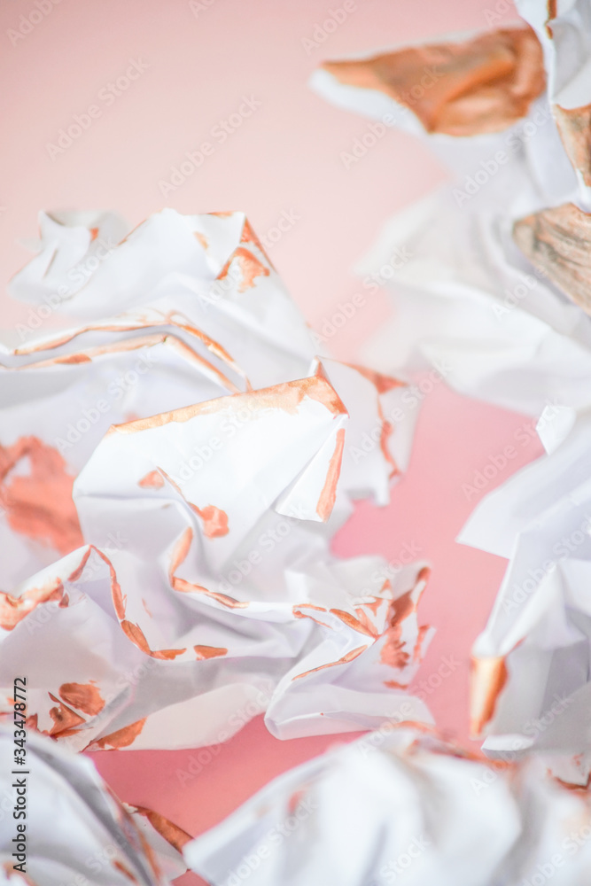 Crumpled paper on pink background. Crumpled paper on pink background.