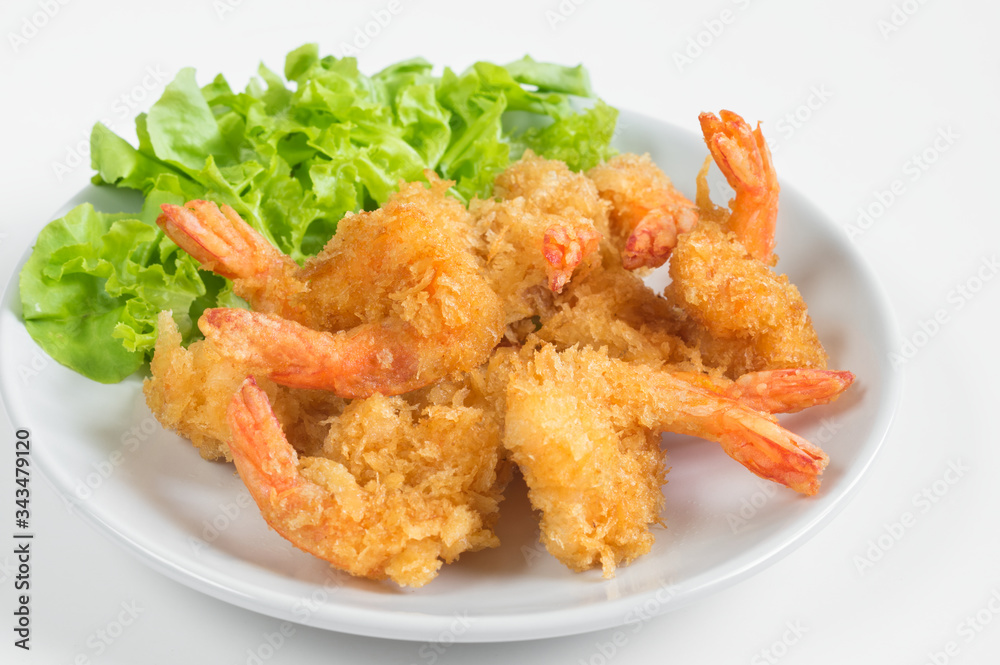 Deep fried shrimps on ceramic plate,white background. Deep fried shrimps on ceramic plate,white background.