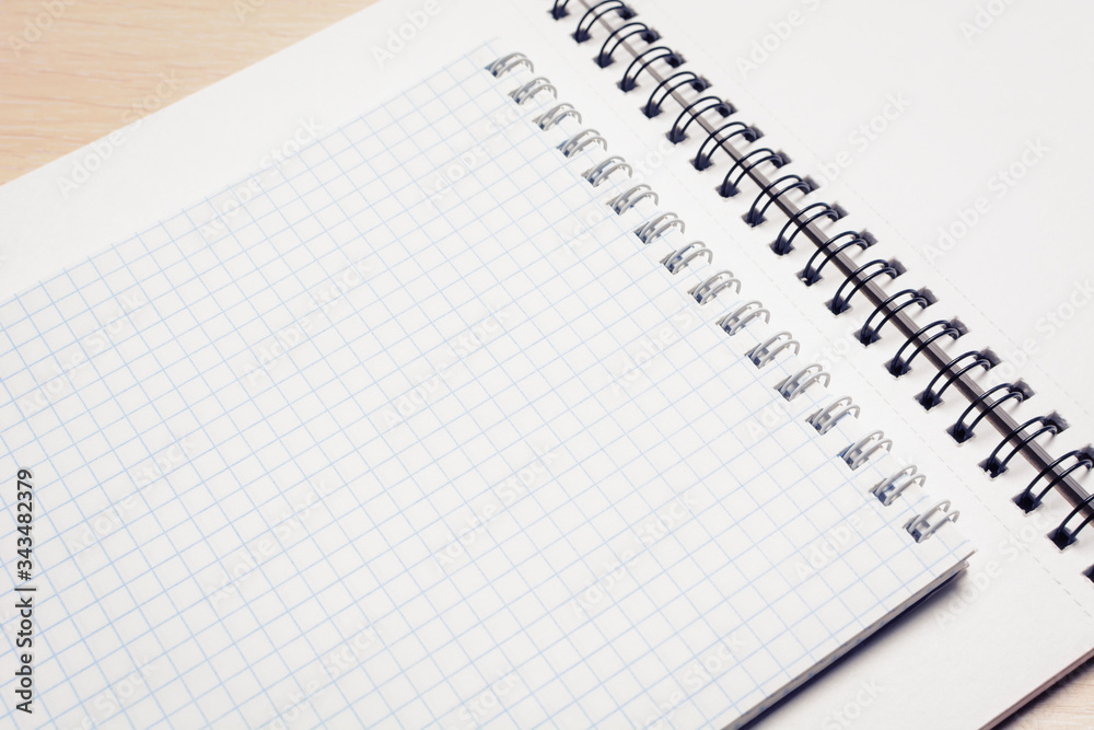 Open white notebooks. Concept analysis of business plan. Open white notebooks. Concept analysis of business plan.