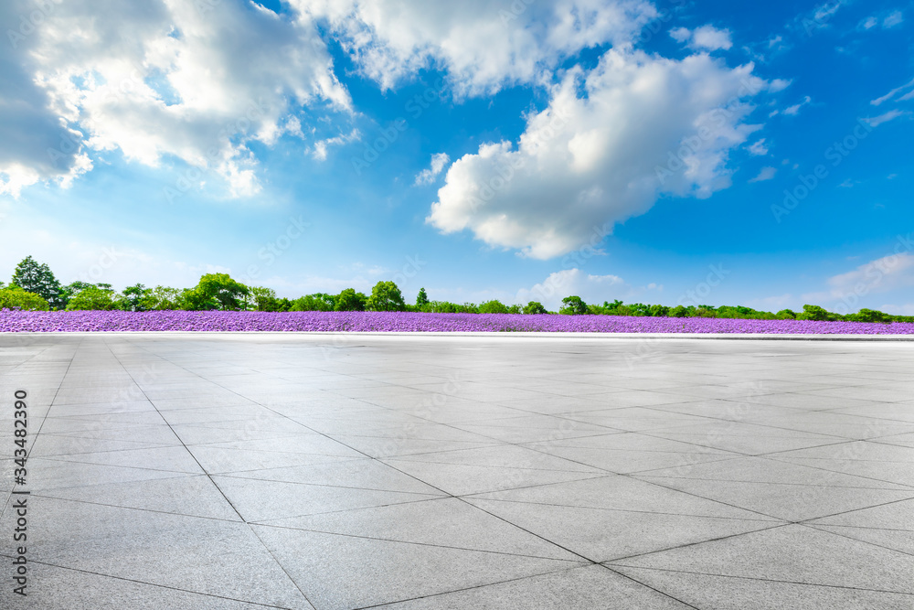 Empty square floor and purple lavender field on a sunny day.