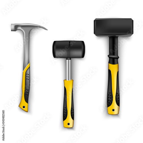 set of construction hammers in different sizes, metal and rubber for tiles with rubber black and yellow handles. Tool for drivers, builders and craftsmen isolated on white background. hammer isolated 