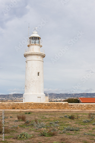  white and old lighthouse in cyprus