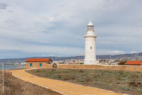  white and old lighthouse in cyprus