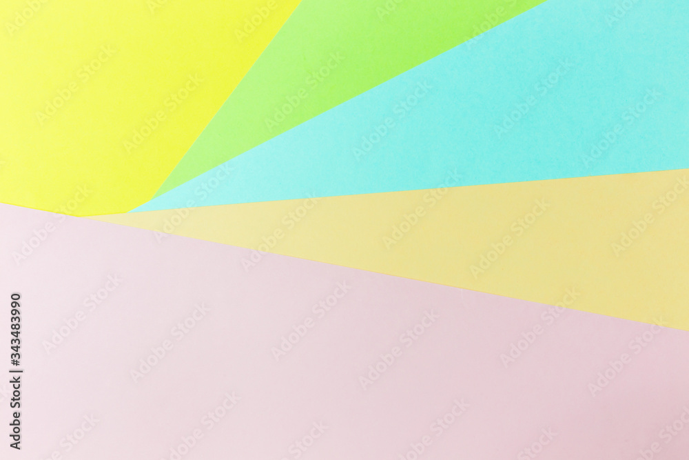 Pastel papers color background is nested backdrop flat lay. green, light green, pink, yellow, blue