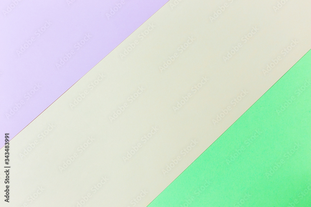 Pastel papers color background is nested backdrop flat lay. green, pink, orange