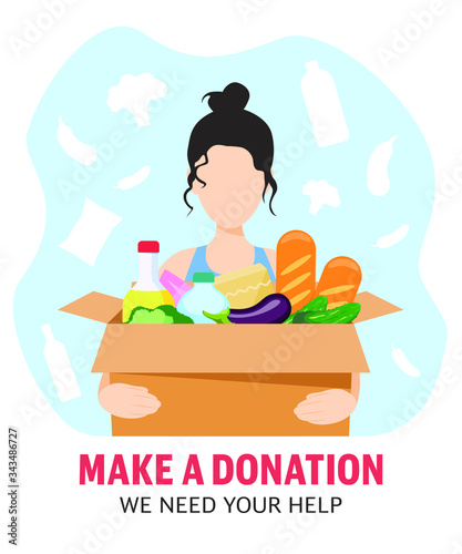 The girl holds a box with food. Food delivery. Food donation.